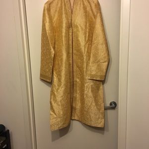 Traditional men’s Sherwani wedding attire.